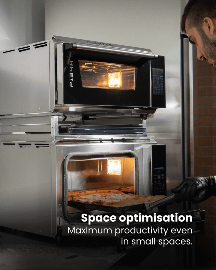 A person stacks two Black Rock Grill Effeuno PRO & Evolution ovens using the Stacking Kit. Text reads: Space saved. Boost productivity with the Effeuno Stacking Kit—even in compact kitchens.