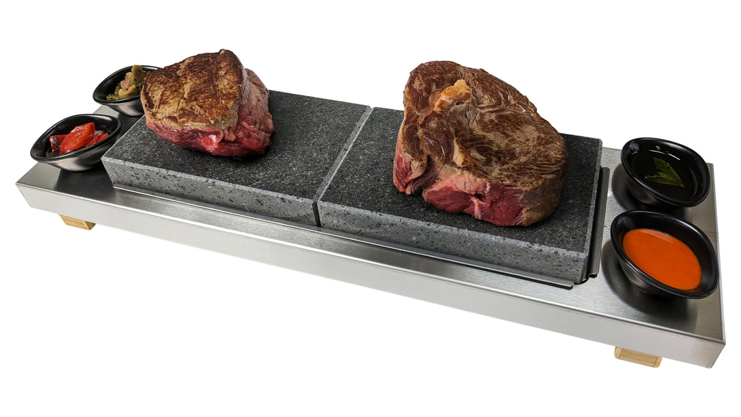 steaks cooking on the hot rock bird eye view
