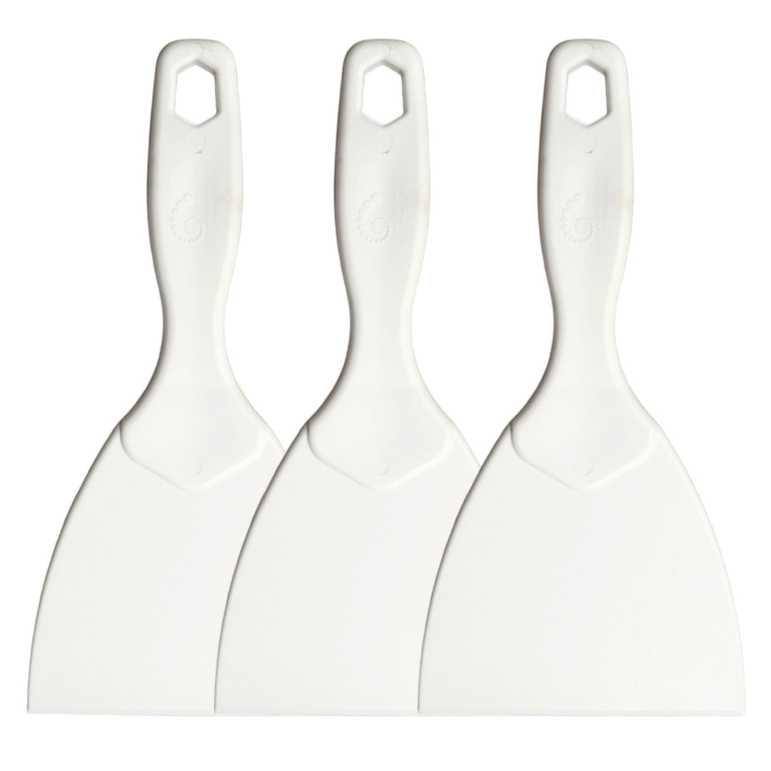 3 plastic dough paddles all with paddles facing down, slightly overlapped