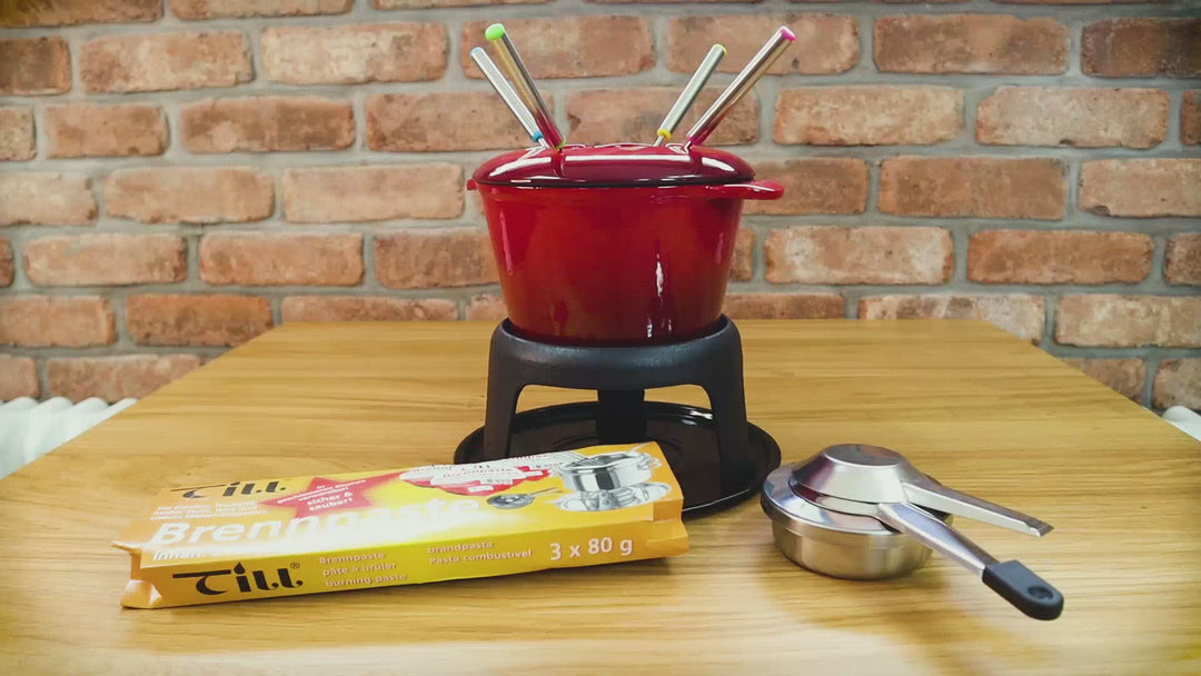 till brennpaste set up and setting the pot into a fondue burner for a fondue set