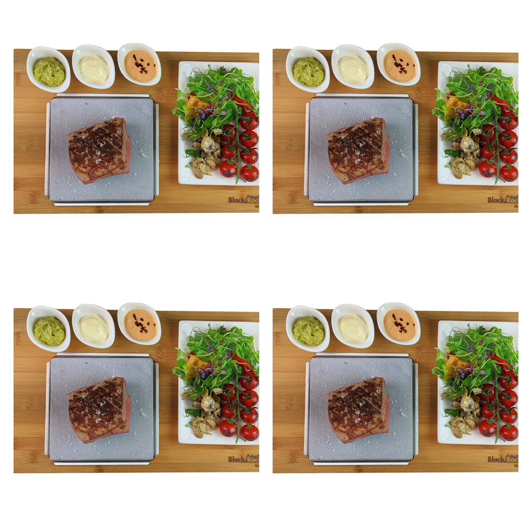 Four identical images showcase the Black Rock Grill Steak On The Stone Set featuring a seasoned raw steak on a cutting board with small bowls of sauces. A plate of mixed greens, cherry tomatoes, and roasted vegetables is neatly arranged on a wooden surface, ideal for hot stone dining.