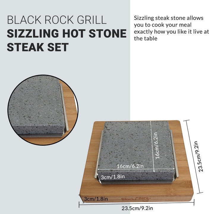 Heres an image of the NEW Black Rock Grill Lava Stone Steak Multi Pack, by Black Rock Grill. It features a 23.5cm x 23.5cm lava stone slab on a bamboo platter with a 16cm x 16cm square marked for precise steak cooking to your preference.