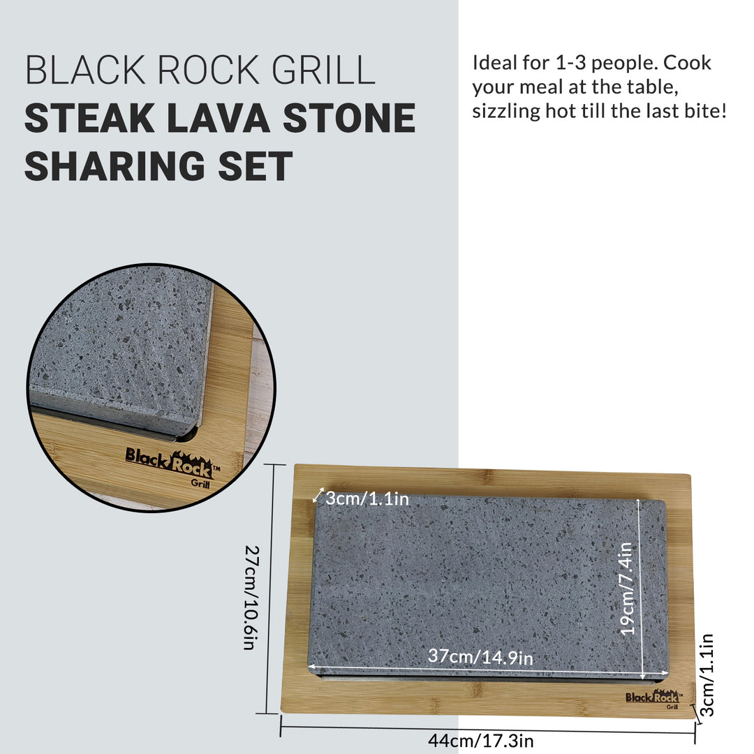 The Black Rock Grill: Steak Stone Set for 2 highlights its rectangular lava stone on a wooden board, perfect for hot stone cooking. Ideal for table dining with 1-3 people, it offers detailed dimensions of both the stone and board.