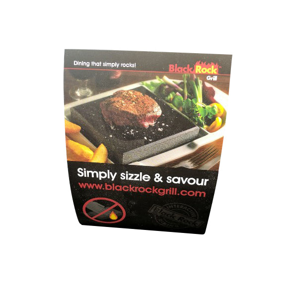 Black Rock Grills ROXY12 packaging displays a cooked steak on a hot stone, veggies, and fries. It promises Dining that simply rocks! and Simply sizzle & savour. A no oil symbol indicates healthy dining. Enjoy an interactive meal!.