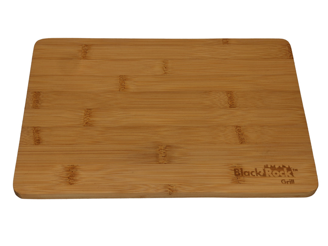 This rectangular wooden serving board, measuring 30 x 20 x 1.2 cm, is crafted from sustainable bamboo and features a smooth finish with Black Rock Grill custom laser engraved in the lower right corner.