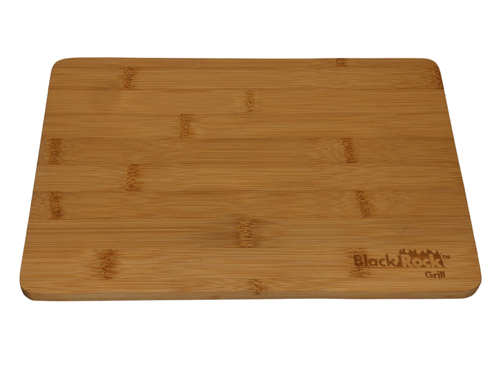 This rectangular wooden serving board, measuring 30 x 20 x 1.2 cm, is crafted from sustainable bamboo and features a smooth finish with Black Rock Grill custom laser engraved in the lower right corner.