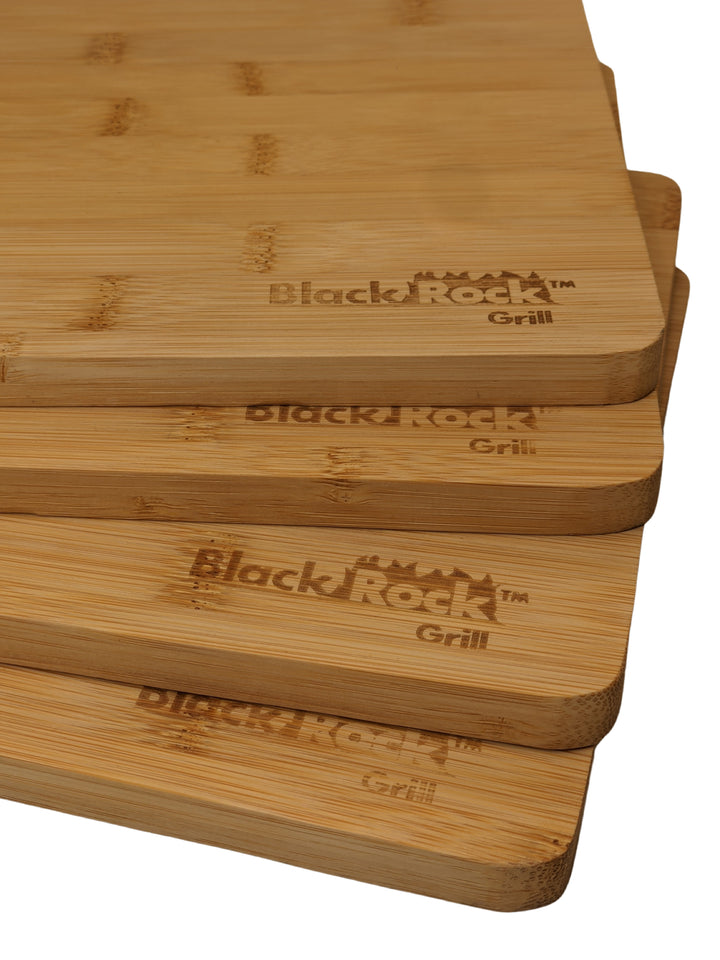 Four rectangular, sustainable bamboo cutting boards feature the Black Rock Grill logo, smooth surfaces, and rounded edges for practical use and elegant presentation. This set of 24 wooden serving boards measures 30 x 20 x 1.2 cm each.