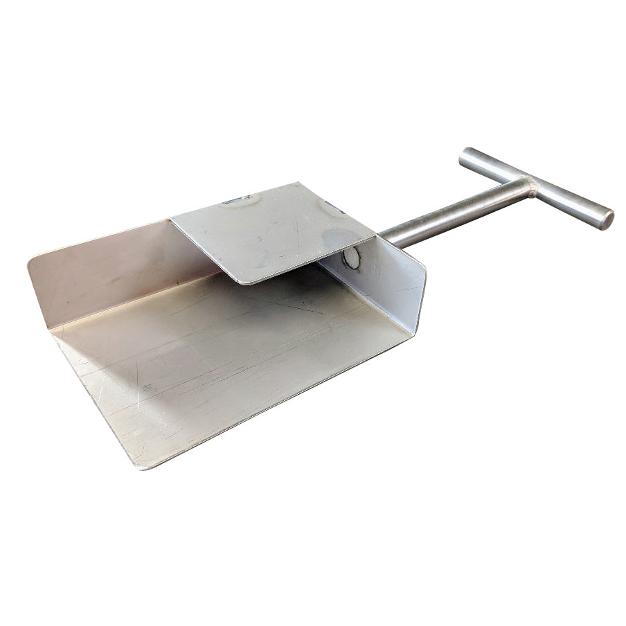 The Black Rock Grill ROXY12 set includes a metallic industrial-like tool with a long handle and scoop design, perfect for interactive table cooking. The T-shaped handle ensures easy grip while its smooth surface enhances the dining experience.