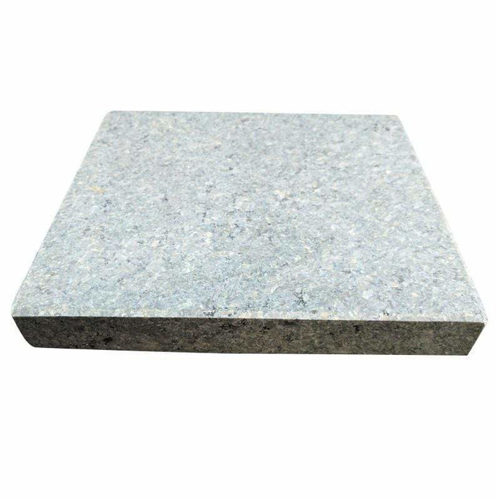 Close-up of a square, light gray granite Big Sizzling Steak Stone Rock from Black Rock Grills ROK-21, featuring speckles of darker gray, blue, and white for a polished rock look. Edges display visible tile thickness. Available in cases of 6.