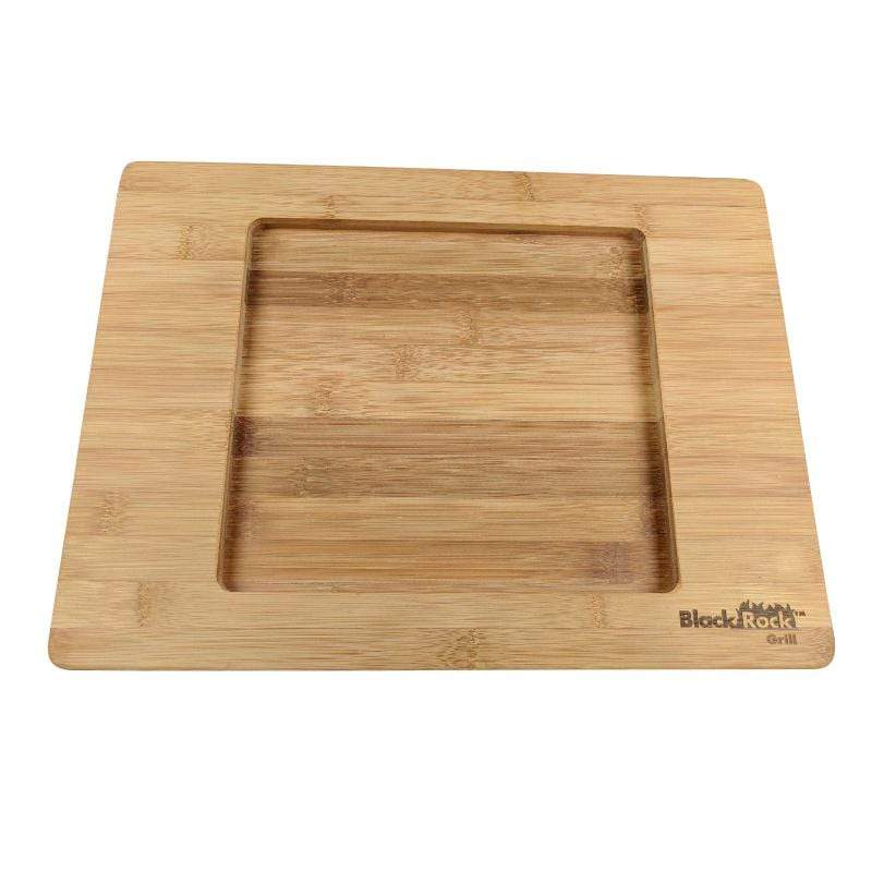 This square bamboo cutting board from Black Rock Grill, with a recessed center and rounded edges, boasts natural light brown hues and visible grain patterns. It features the Black Rock Grill logo on the bottom right corner, is sustainably crafted, and is available for custom engraving.