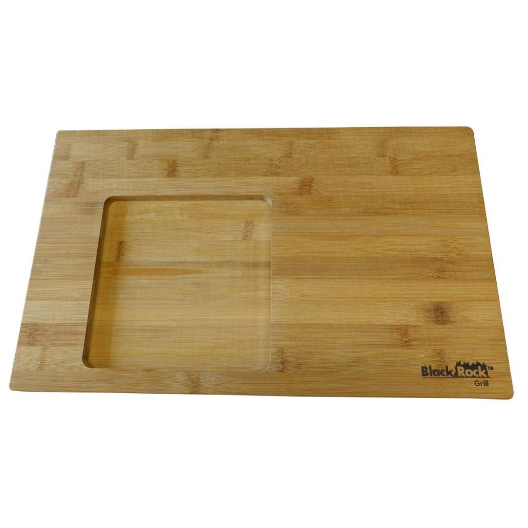The GP-6 Bamboo boards for Steak On the Stone sets by Black Rock Grill features a rectangular shape with an inset square groove on one side and the brand logo in the bottom right corner. Ideal for custom engraving, these bamboo boards combine functionality with personalized style.