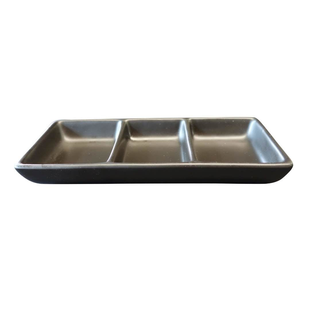 The Black Rock Grill GP-8MB is a sleek matt black porcelain dish with three sections, perfect for condiments or appetizers. Its elegant contrast against a white background makes it an ideal stylish dipping pot. Available in a case of 8.