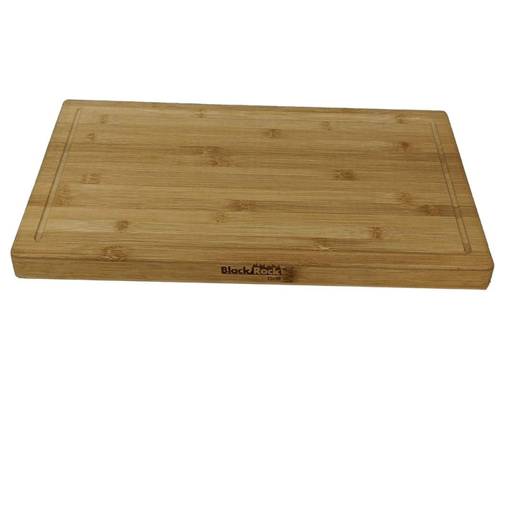 The Black Rock Grill Large Wooden Serving Board has a natural bamboo finish with an edge groove and is ideal for custom laser engraving. It features the Black Rock Grill logo on one side.
