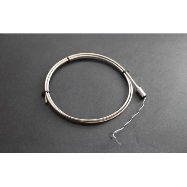 A coiled guitar string against a black background, partially unwound to reveal inner wires, mirrors the precision and durability of the Black Rock Grills Mineral Insulated Thermocouple for Omron BRSeries cables.
