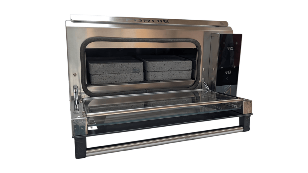 A commercial double-deck pizza oven with metal handles, a red control panel with dials on the right, and a black stand with a lower shelf. The oven doors are open, revealing stone baking surfaces.