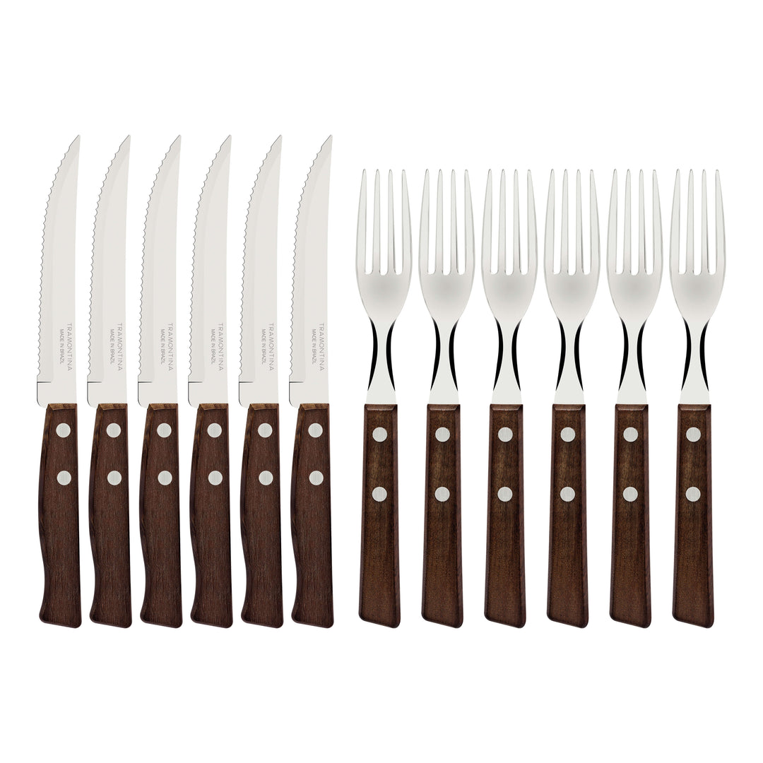 The Tramontina 12 Piece Steak Cutlery Set features six stainless steel knives and forks with sleek blades, dark Polywood handles, and three silver rivets each, arranged side by side for a service for six.