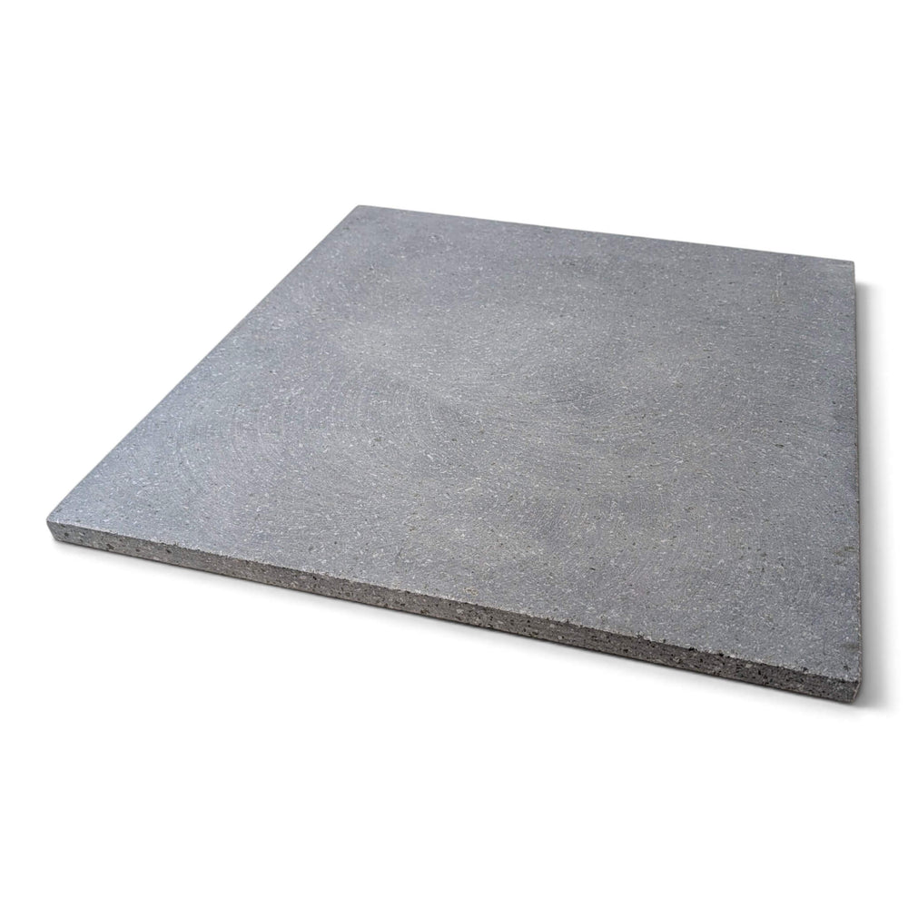 Side view of a large square grey Lava pizza oven stone that fits the effeuno P150H and P150HA pizza ovens square with beveled edges, shown on a plain white background.