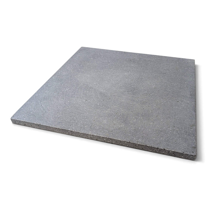 Side view of a large square grey Lava pizza oven stone that fits the effeuno P150H and P150HA pizza ovens square with beveled edges, shown on a plain white background.