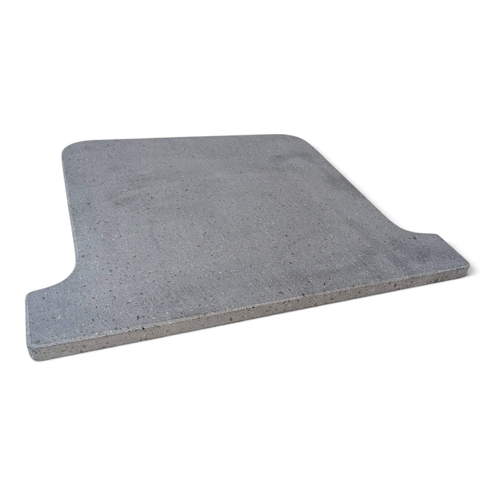A grey Lava pizza oven stone that fits the ooni koda 16 pizza oven square with rounded corners and a stepped, notched edge on one side, shown on a plain white background.