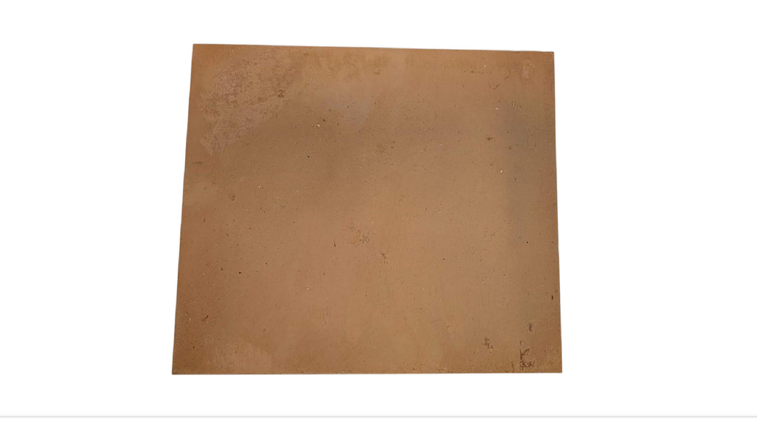 The Effeuno Small Biscotto Clay Pizza Stone (32x32x2cm) is a square, light brown tile with subtle speckles, echoing traditional biscotto claystone used in pizza ovens, shown here against a white background.