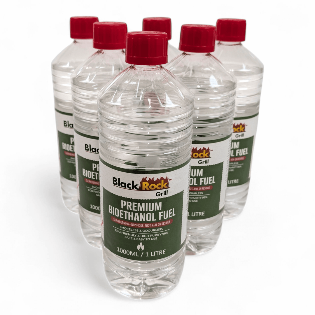 Six clear plastic bottles of Black Rock Grill Premium Bioethanol Fuel – 1L Plant-Based Clean Burning Liquid for Fireplaces, Fire Pits & Stoves are grouped together, each eco-friendly and perfect for clean, sustainable burning.