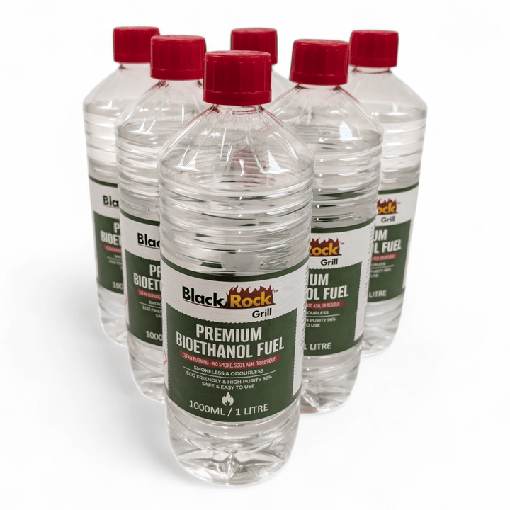 Six clear plastic bottles of Black Rock Grill Premium Bioethanol Fuel – 1L Plant-Based Clean Burning Liquid for Fireplaces, Fire Pits & Stoves are grouped together, each eco-friendly and perfect for clean, sustainable burning.