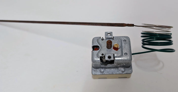 The Black Rock Grill Effeuno 515°C Overheat Reset Switch for P134H/P134HA (450°C, 500°C, 509°C) features a long probe, coiled green wire, adjustment screws, and red indicator. Often used in Effeuno ovens. Plain white background shown.