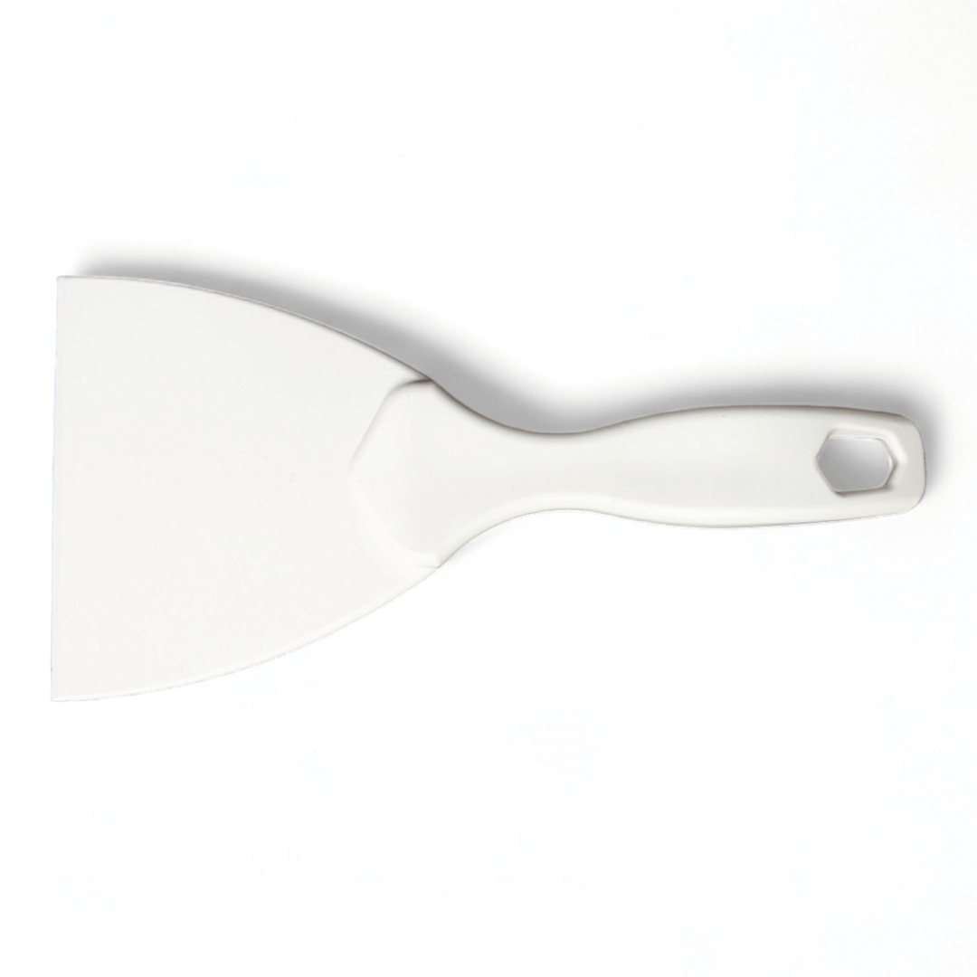 Single White Plastic Dough Paddle seen from a birds eye view 