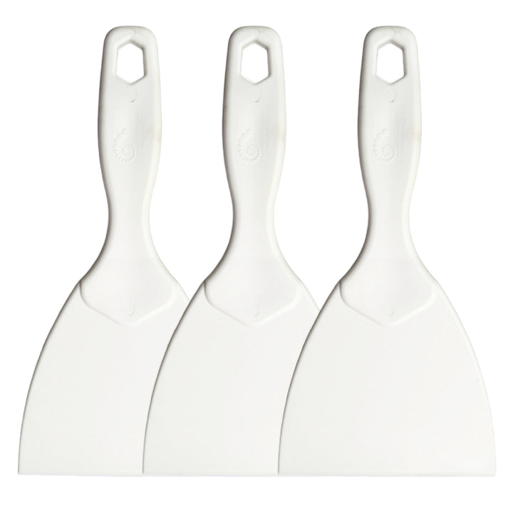 3 plastic dough paddles all with paddles facing down, slightly overlapped 