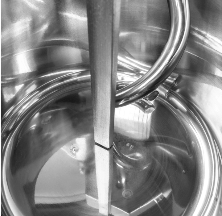 Close-up view of the MFItaly MINIMIX STD 5 Dark Grey Spiral Dough Kneading Machine by Mfitaly, showcasing its shiny stainless steel interior, metal spiral mixing blade, curved handle, and sleek industrial design—expertly crafted in Italy.