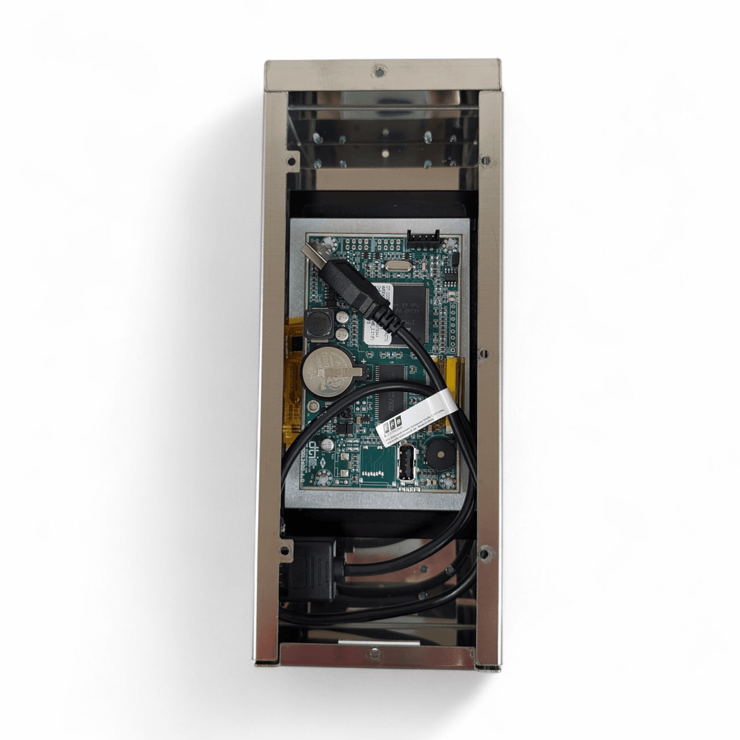 A top-down view of an open Black Rock Grill Digital Display Board for P134H Evo shows exposed circuitry, a motherboard, a coin cell battery, and a coiled black USB cable inside the metal case against a white background.