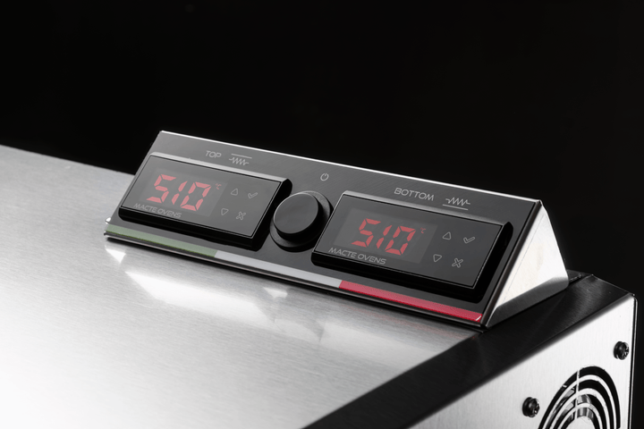 Detailed view of the digital PID temperature controllers on the Macte Advanced electric pizza oven.