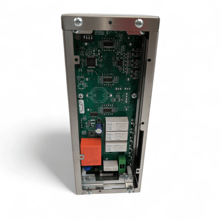 A close-up of the Effeuno P134H PRO Control Panel by Black Rock Grill shows its green circuit board with relays, capacitors, and connectors inside a metallic enclosure.