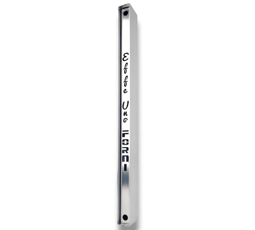 A sleek, vertical metal bar with embossed black lettering reads Elebte Uno LORCI in an elegant style, similar to the precision of an Effeuno Steamer for Baking Bread. It features rounded ends and is set against a plain white background.