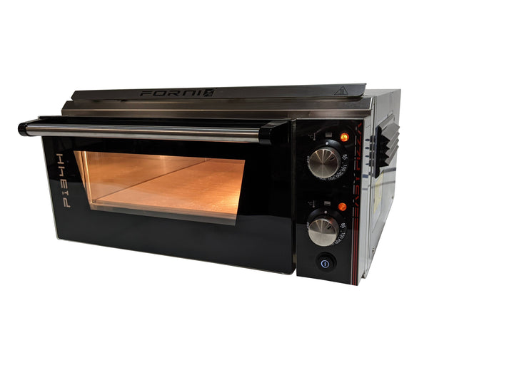 The Black Rock Grill Effeuno P134H 509 Manual Pizza Oven, featuring manual controls, a glass door, control knobs, and indicator lights, sits on a white background with its interior light illuminating the baking chamber.